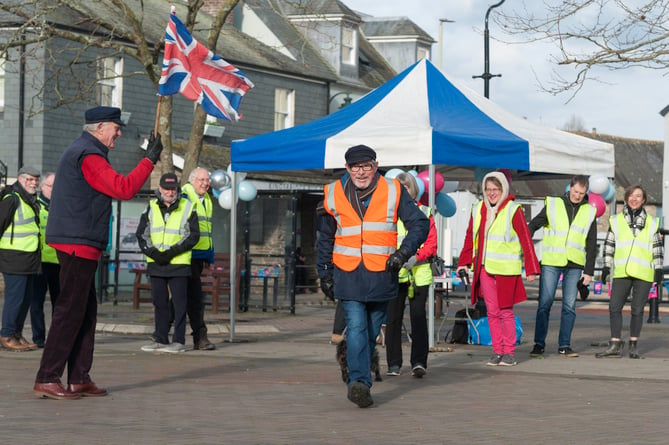 Peter Ralph leading walkers in their 21km challenge 