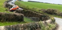 Car crashes into farmer’s field