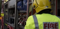 Fire crews battling blaze at yard