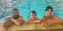 Dad and sons complete swim challenge