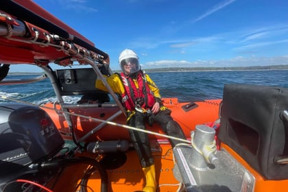 Dart RNLI rescue crew with engine troubles