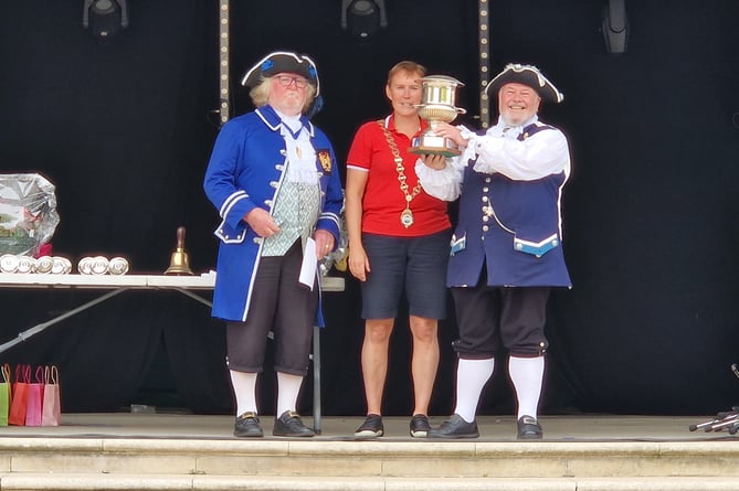 From Left Kingsbridge Town Crier Roger Pinder, Cllr Mayor Julia Wingate and winner Terry Ford