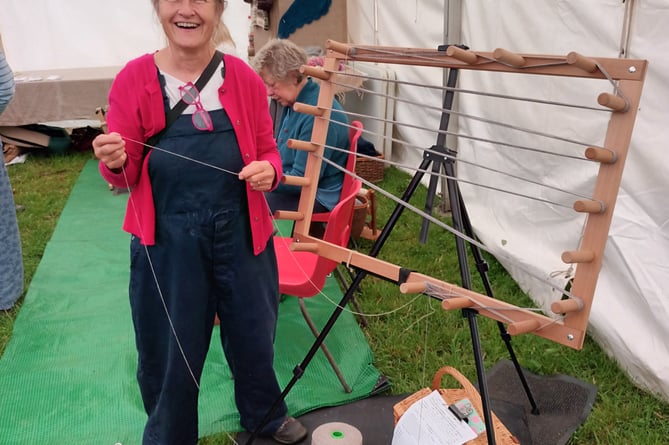 Elizabeth winding a warp 