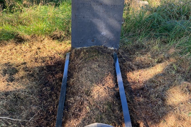 One of the restored graves