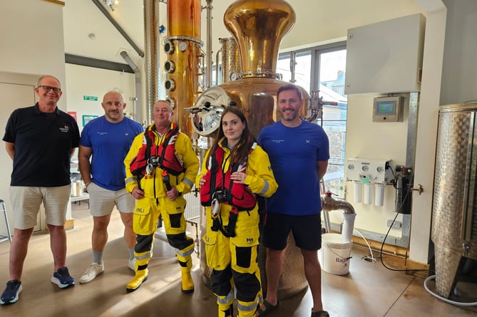 Members of Salcombe RNLI and Salcombe Gin