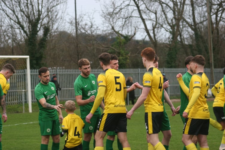 Buckland Athletic and Ivybridge Town players pre-match